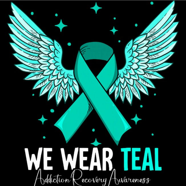 A teal awareness ribbon with large angel wings on a black background, with the text 'WE WEAR TEAL' and 'Addiction Recovery Awareness' below.
